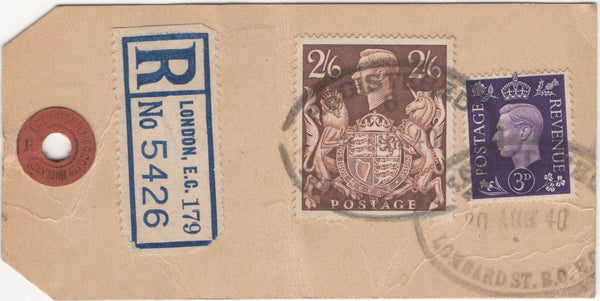 135885 1940 REGISTGERED PARCEL TAG WITH KGVI 3D VIOLET (SG467) AND 2/6 BROWN (SG476).